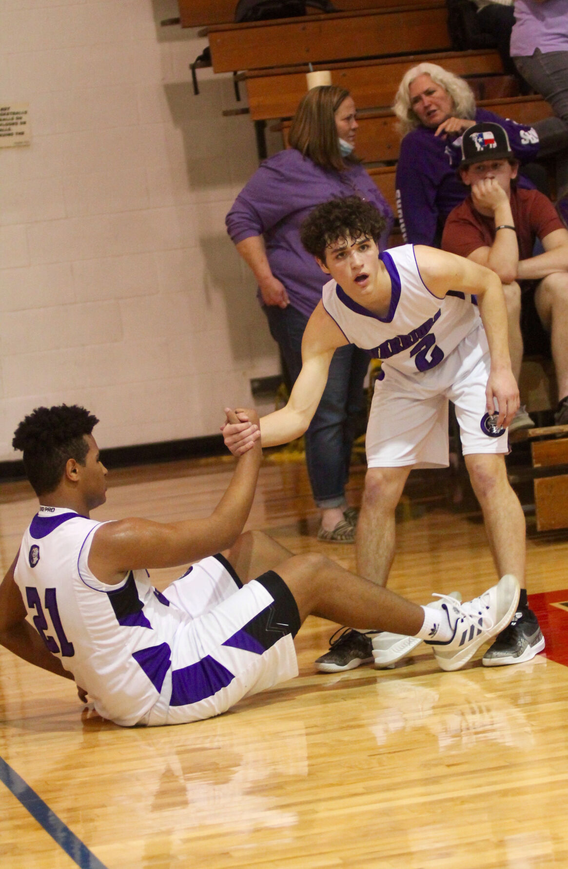 CC Jackson Horton helps Bryce Haralson.jpg